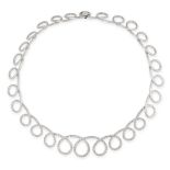 A DIAMOND COLLAR NECKLACE in 18ct white gold, in scrolling design, the central scrolls set with