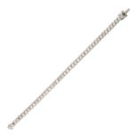 BOODLES, A DIAMOND LINE BRACELET in 18ct white gold, set with a row of round cut diamonds all