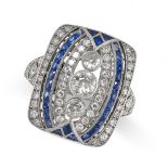 A DIAMOND AND SAPPHIRE DRESS RING in platinum, the cushion shaped face set with a trio of