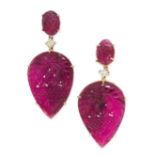 A PAIR OF PINK TOURMALINE AND DIAMOND EARRINGS each comprising a large pear shaped carved pink