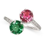 A DIAMOND, PINK TOURMALINE AND TSAVORITE GARNET TOI ET MOI RING set with a round cut pink tourmaline