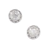 A PAIR OF DIAMOND STUD EARRINGS in 18ct white gold, each set with a round brilliant cut diamond,