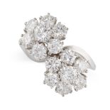 VAN CLEEF AND ARPELS, A DIAMOND FLEURETTE RING in 18ct white gold, set with round brilliant cut