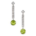 A PAIR OF PERIDOT AND DIAMOND DROP EARRINGS in platinum, each set with a row of round cut