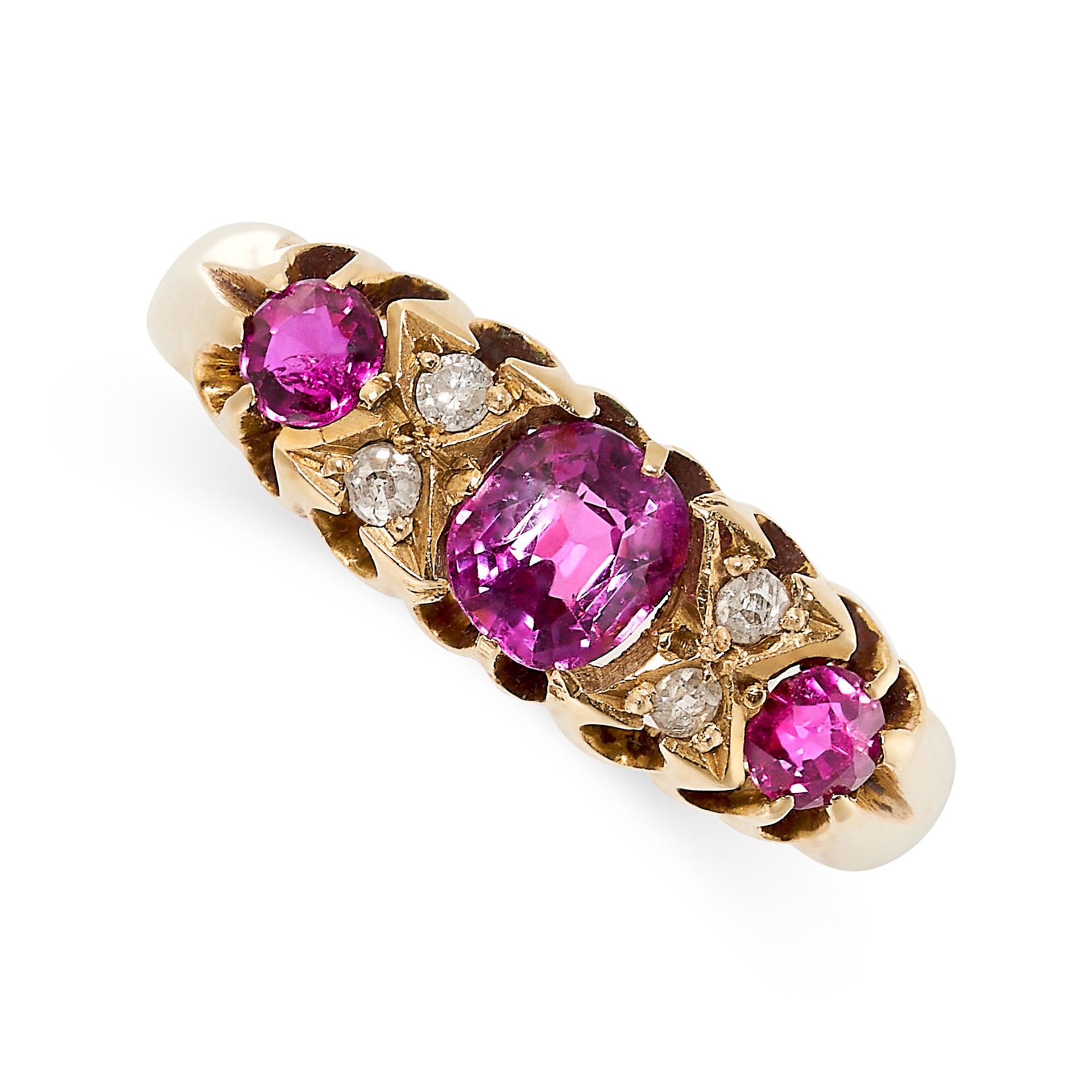 AN ANTIQUE SPINEL AND DIAMOND DRESS RING in 18ct yellow gold, set with a trio of graduated cushion