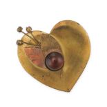 A PAIR OF BROOCHES a base metal, heart shape brooch set with a brown cabochon stone over two cut