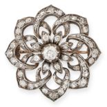 AN ANTIQUE DIAMOND FLOWER BROOCH, 19TH CENTURY in silver and yellow gold, set centrally with an