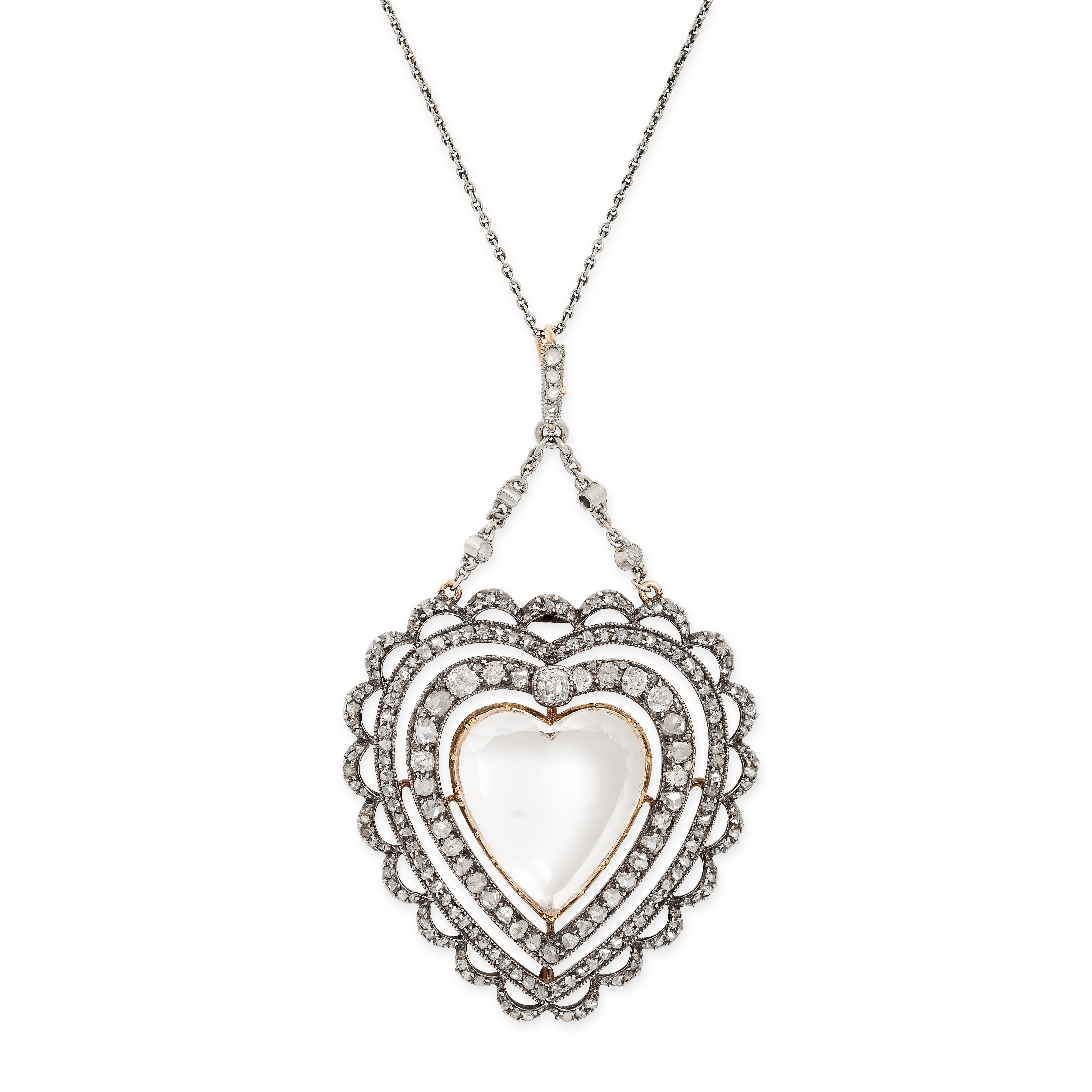 CHILD & CHILD, A FINE ANTIQUE ROCK CRYSTAL AND DIAMOND HEART PENDANT in yellow gold and silver,