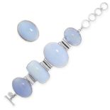 A CHALCEDONY BRACELET AND RING SUITE in silver, the bracelet set with four oval and cushion shaped