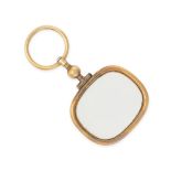 NO RESERVE - AN ANTIQUE QUIZZING / MAGNIFYING GLASS in gilt metal, comprising a rectangular