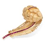 RAYMOND YARD, A VINTAGE RUBY FEATHER BROOCH in 14ct yellow gold, designed as a curled ostrich