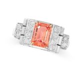 A SAPPHIRE AND DIAMOND DRESS RING in 18ct white gold, set with an emerald cut orangey-pink