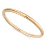 AN ANTIQUE GOLD SLAVE BANGLE, 1918 in 15ct yellow gold, designed as a single gold hoop, British