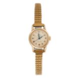 ROLEX, A LADIES GOLD PRECISION WRISTWATCH, 1960S a 9ct gold case to a gold tone stretch strap, inner