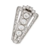 A VINTAGE DIAMOND CLIP BROOCH of shield shaped design, the tapering body set with four principal old