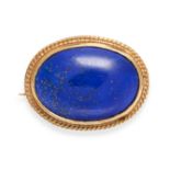 A VINTAGE LAPIS LAZULI BROOCH in 9ct yellow gold, set with a cabochon lapis lazuli within a wirework