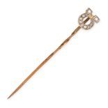 NO RESERVE - AN ANTIQUE DIAMOND HORSESHOE TIE PIN / BROOCH in yellow gold, the pin terminated by a