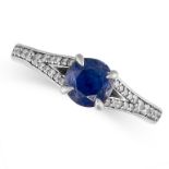 NO RESERVE - A SAPPHIRE AND DIAMOND RING in platinum, set with a round cut sapphire of 1.10 carats