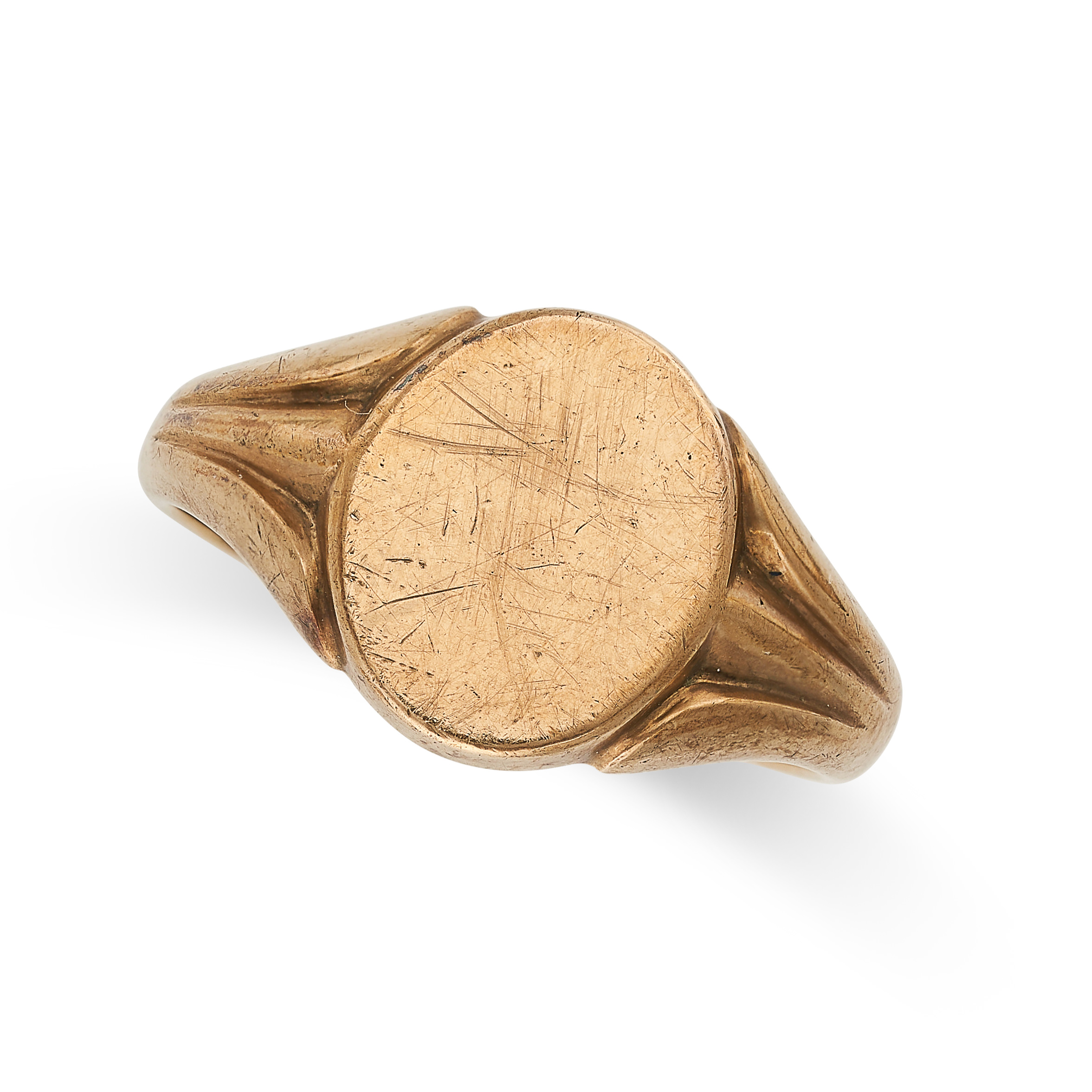 A PLAIN GOLD SIGNET RING, 1957 in 9ct yellow gold, oval face between fluted decoration to the shank,