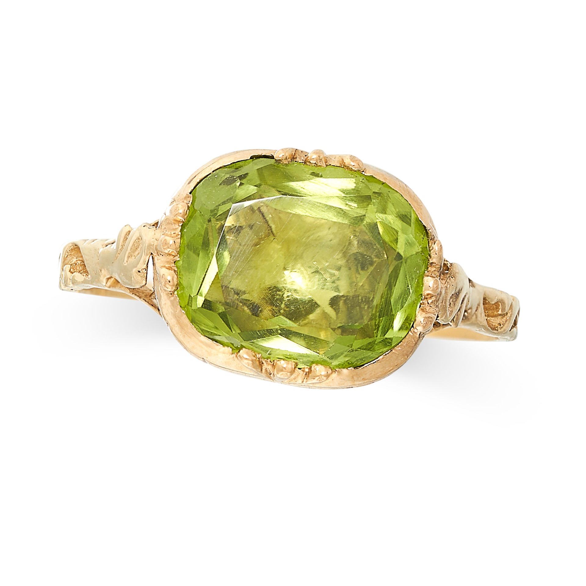 A PERIDOT DRESS RING, 19TH CENTURY AND LATER in yellow gold, later converted to a ring with the