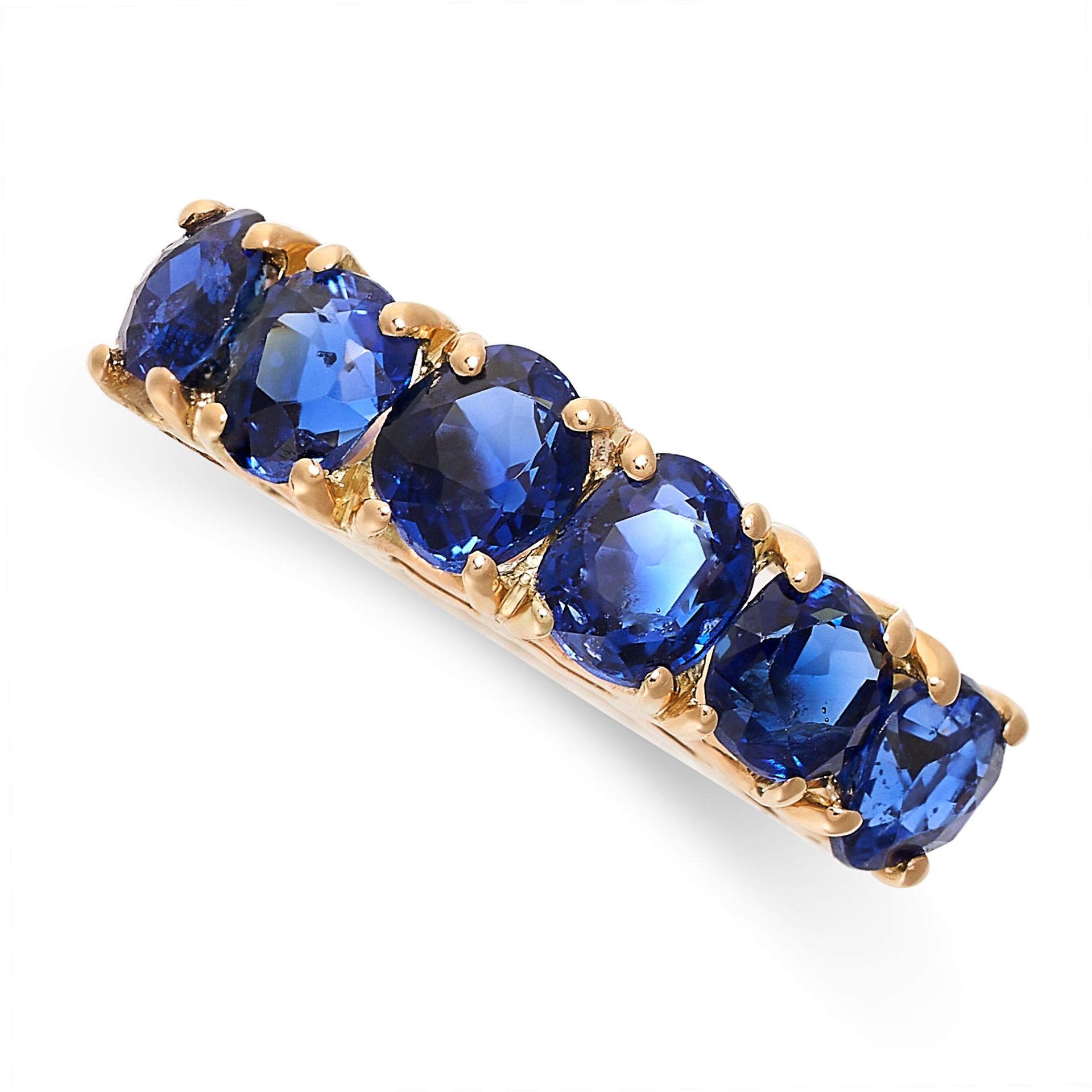 A CEYLON NO HEAT SAPPHIRE AND DIAMOND DRESS RING in yellow gold, set with a row of six cushion cut