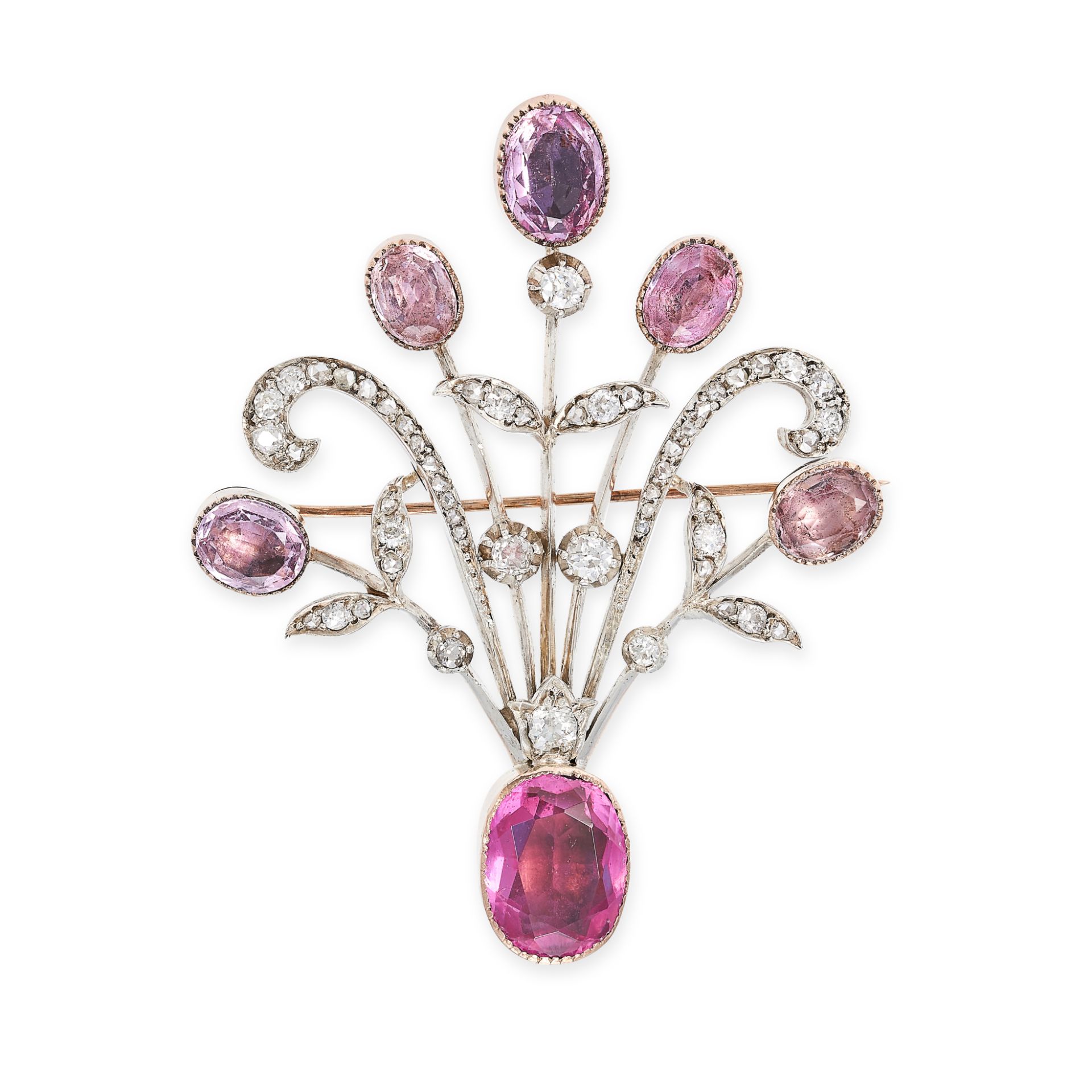 AN ANTIQUE PINK TOPAZ AND DIAMOND BROOCH / PENDANT in yellow gold and silver, designed as spray of