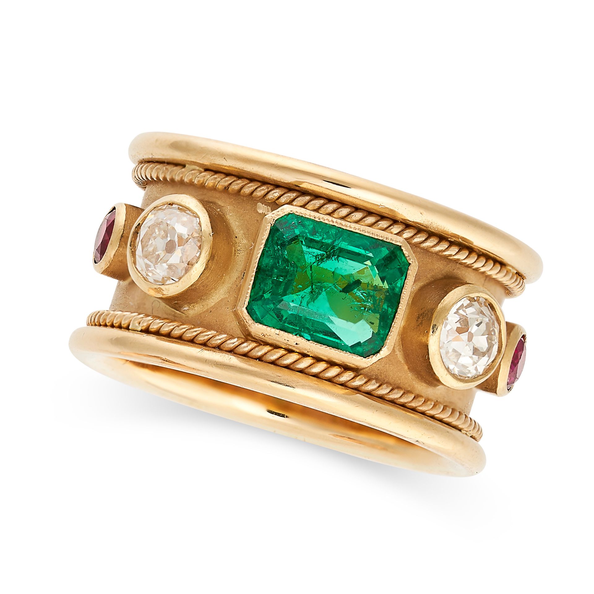 A VINTAGE EMERALD, DIAMOND AND RUBY RING, 1982 in 18ct yellow gold, the band set with an emerald cut