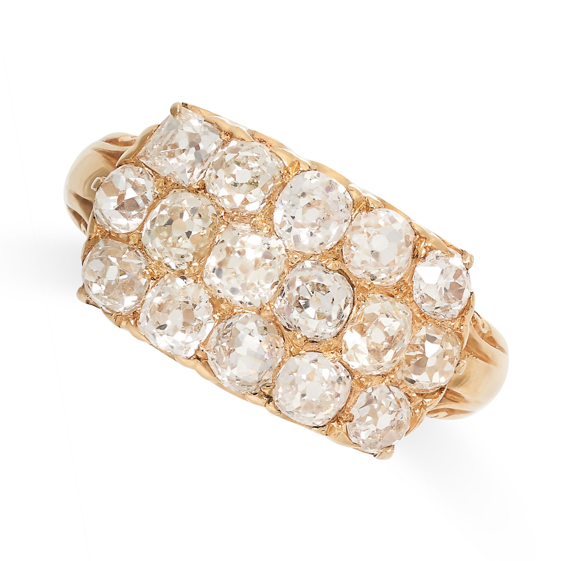 A DIAMOND DRESS RING in yellow gold, set with three rows of old cut diamonds, all totalling 2.2-2.