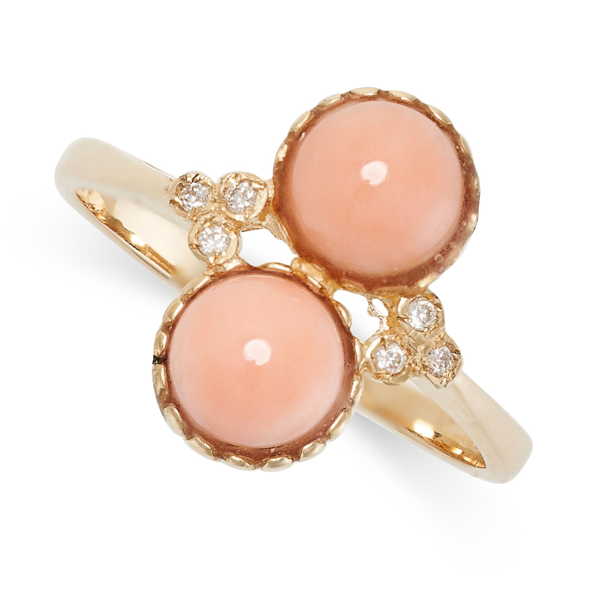 A CORAL AND DIAMOND RING in 9ct gold, set with two round polished pieces of pink coral, accented