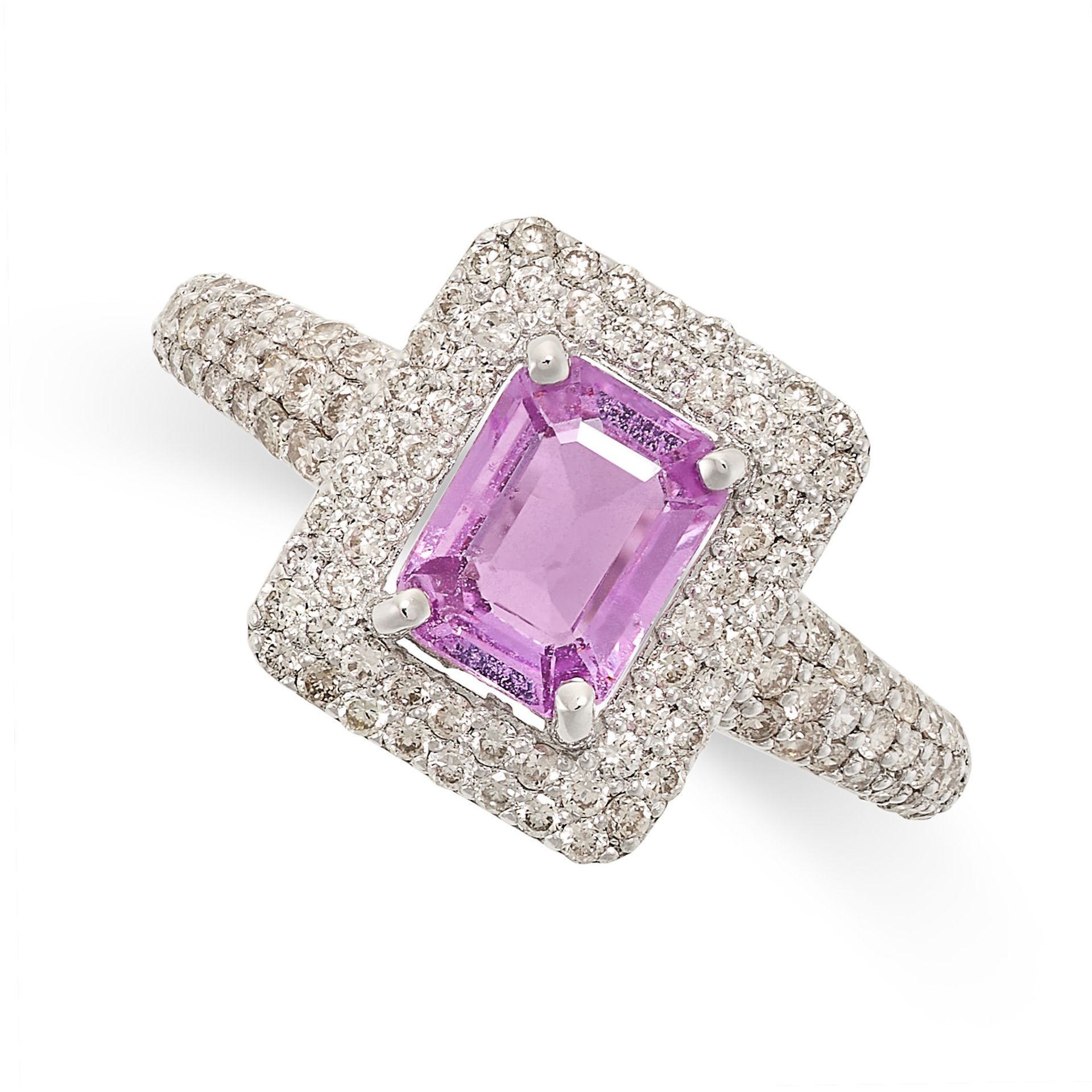 A PINK SAPPHIRE AND DIAMOND DRESS RING in 18ct white gold, set with an emerald cut pink sapphire
