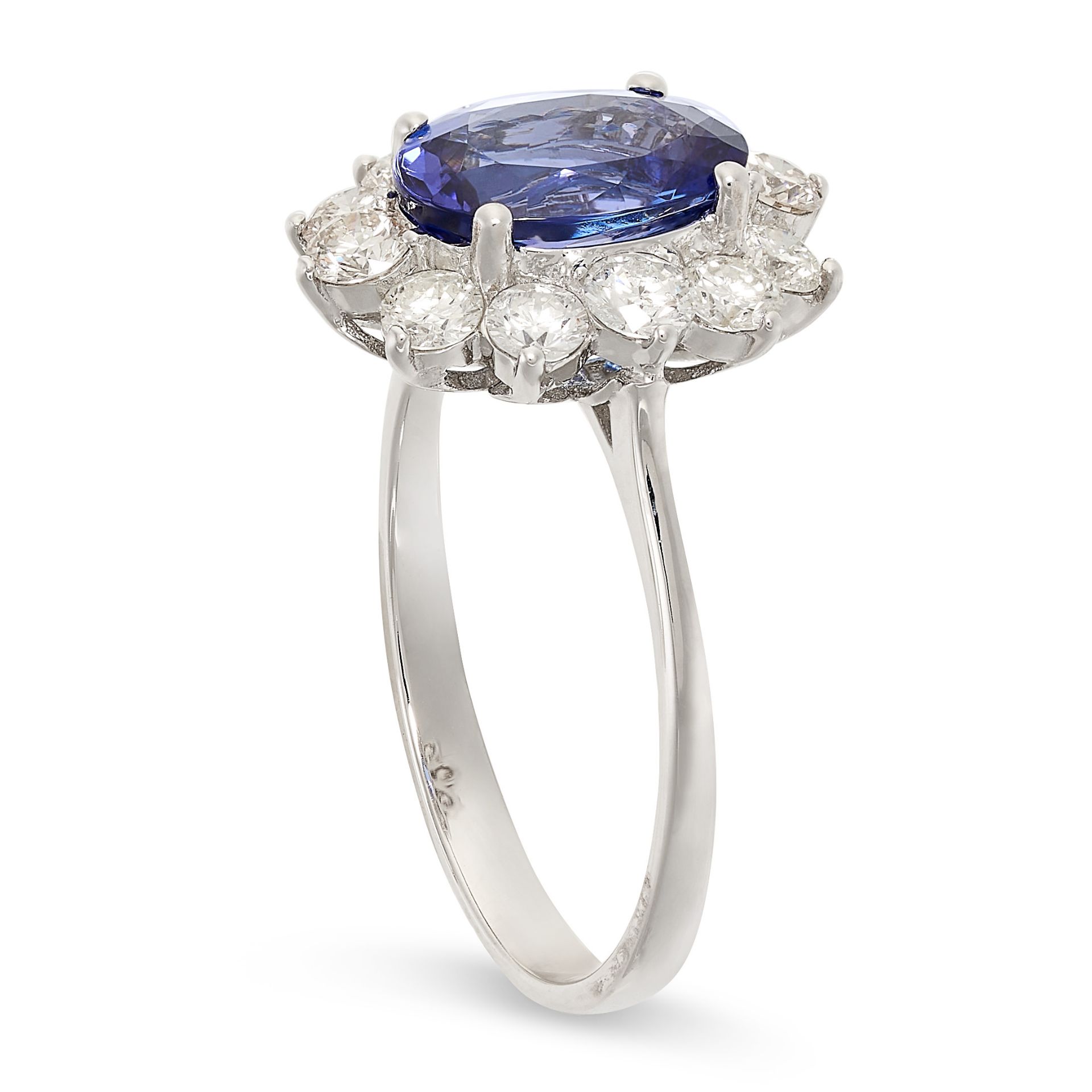 A TANZANITE AND DIAMOND CLUSTER RING in 18ct white gold, set with an oval cut tanzanite of 1.91 - Image 2 of 2