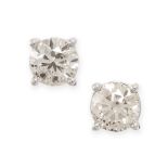 A PAIR OF SOLITAIRE DIAMOND STUD EARRINGS in 18ct white gold, each set with a round brilliant cut