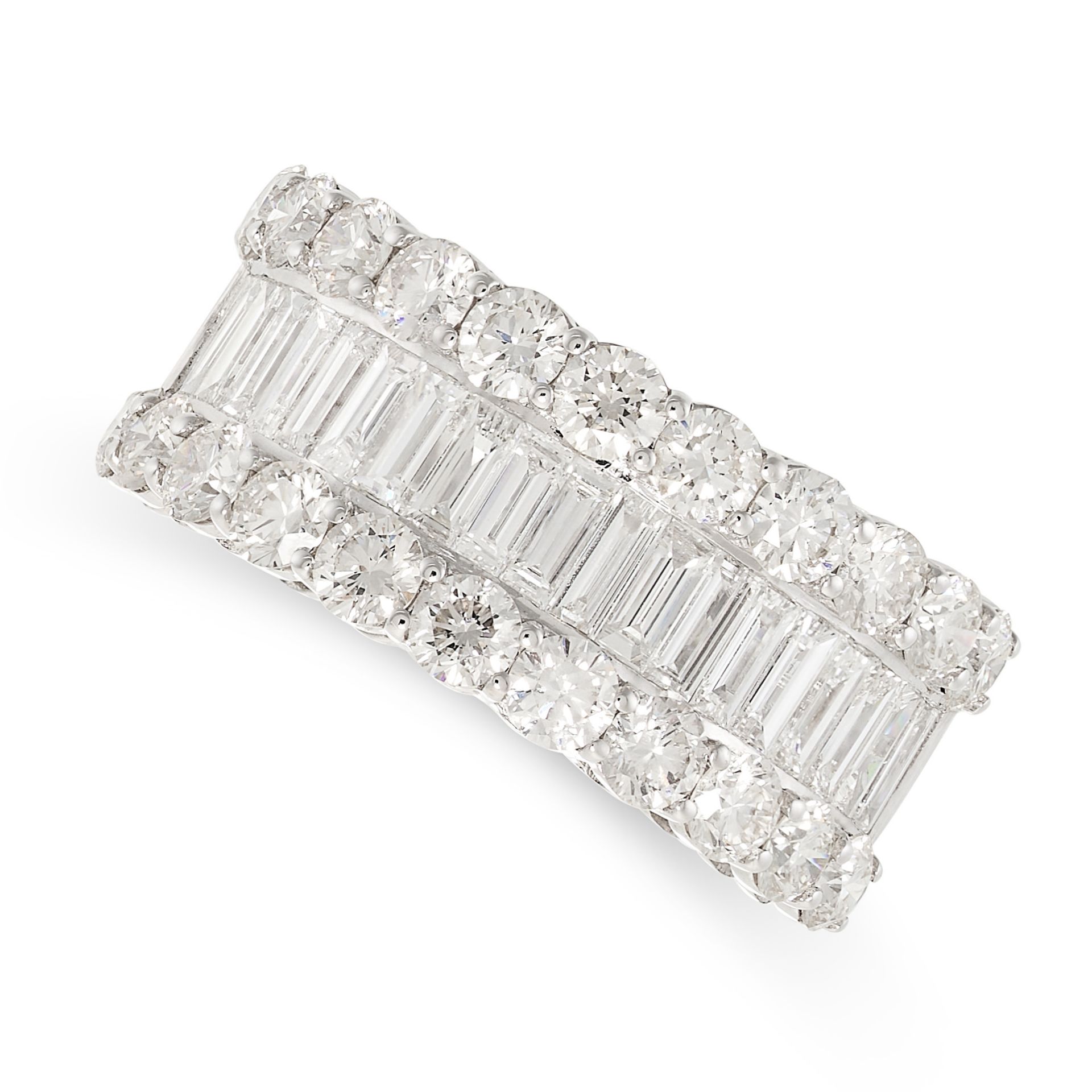 A DIAMOND HALF ETERNITY RING in 18ct white gold, the band half set with a row of baguette cut