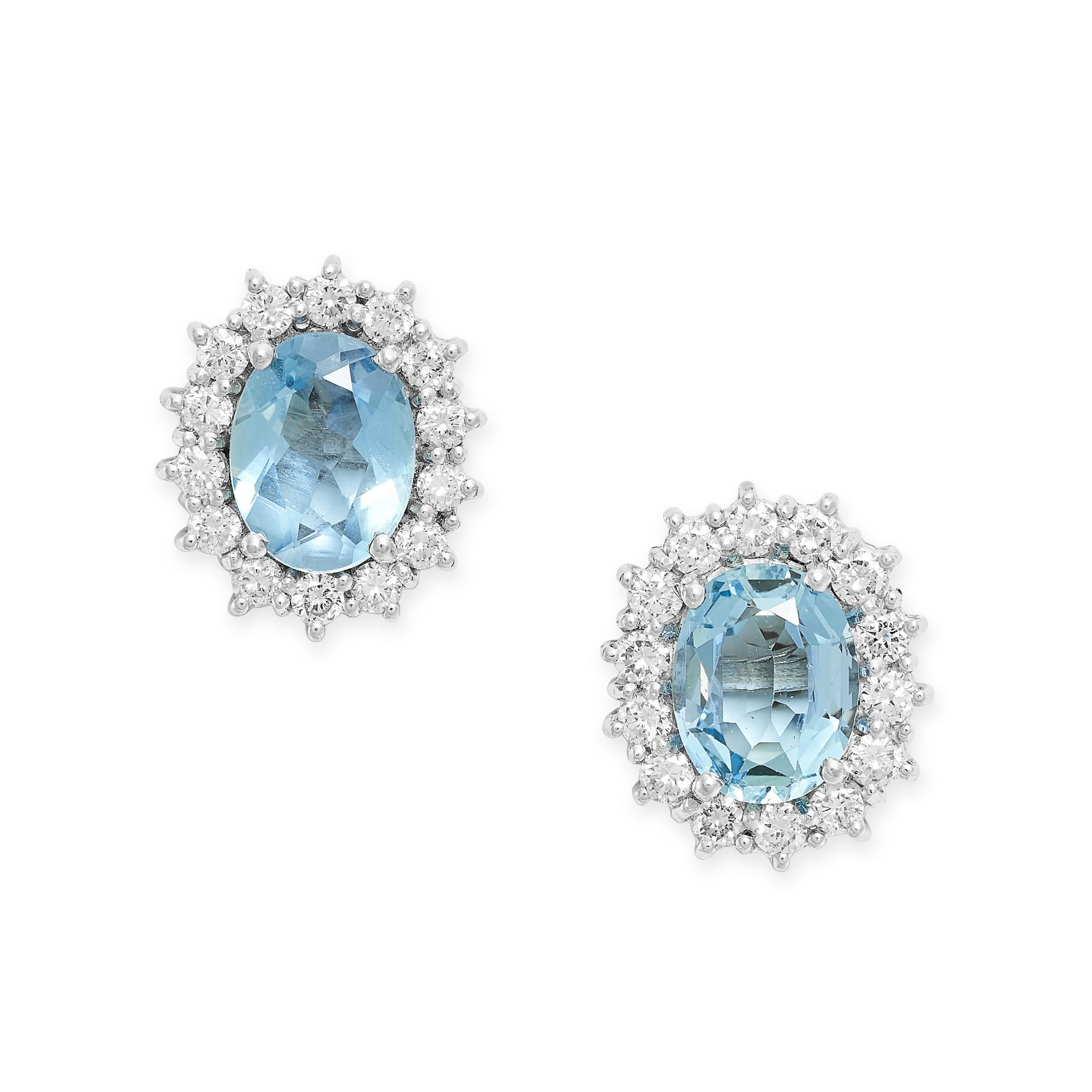 A PAIR OF AQUAMARINE AND DIAMOND CLUSTER EARRINGS each set with an oval cut aquamarine within a