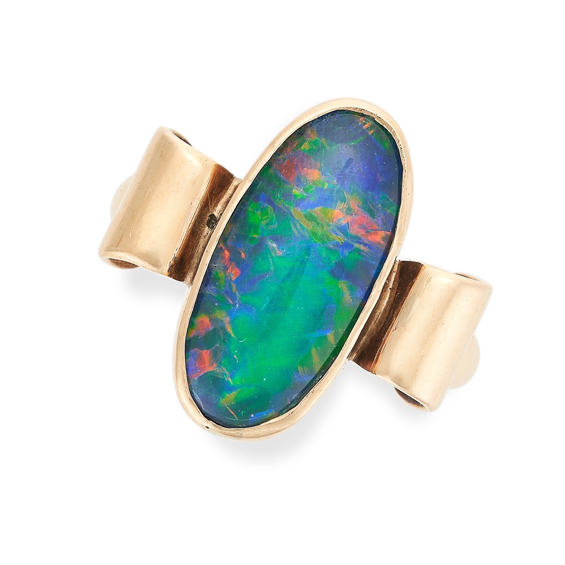 A VINTAGE OPAL RING in 9ct yellow gold, set with a black opal triplet between scrolling motifs,