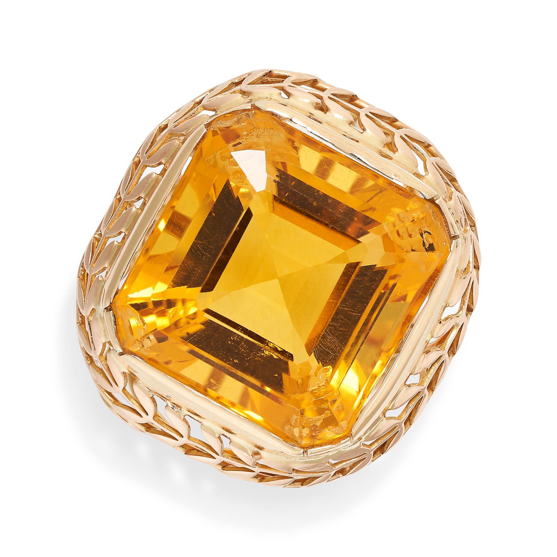 A CITRINE RING in 18ct gold, set with an octagonal step cut citrine in a stylised mount, French