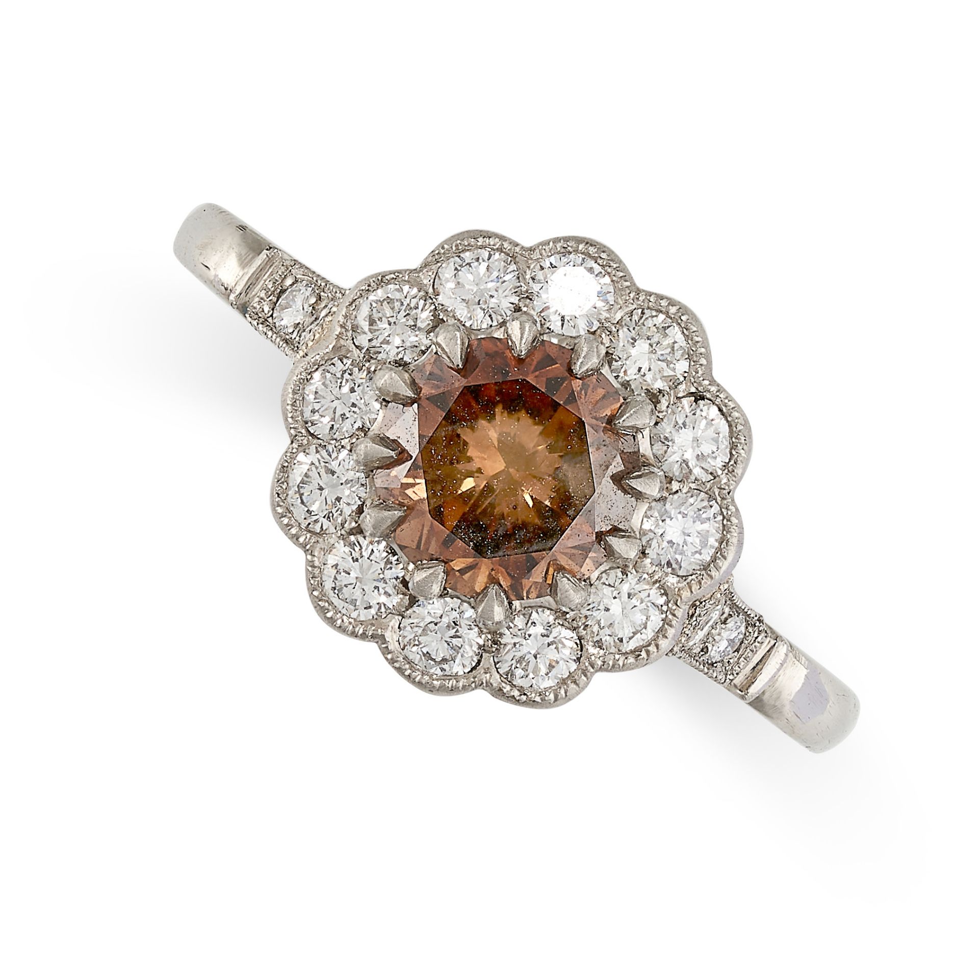 A FANCY COLOURED DIAMOND AND WHITE DIAMOND CLUSTER RING set with a round cut brown diamond of 1.01