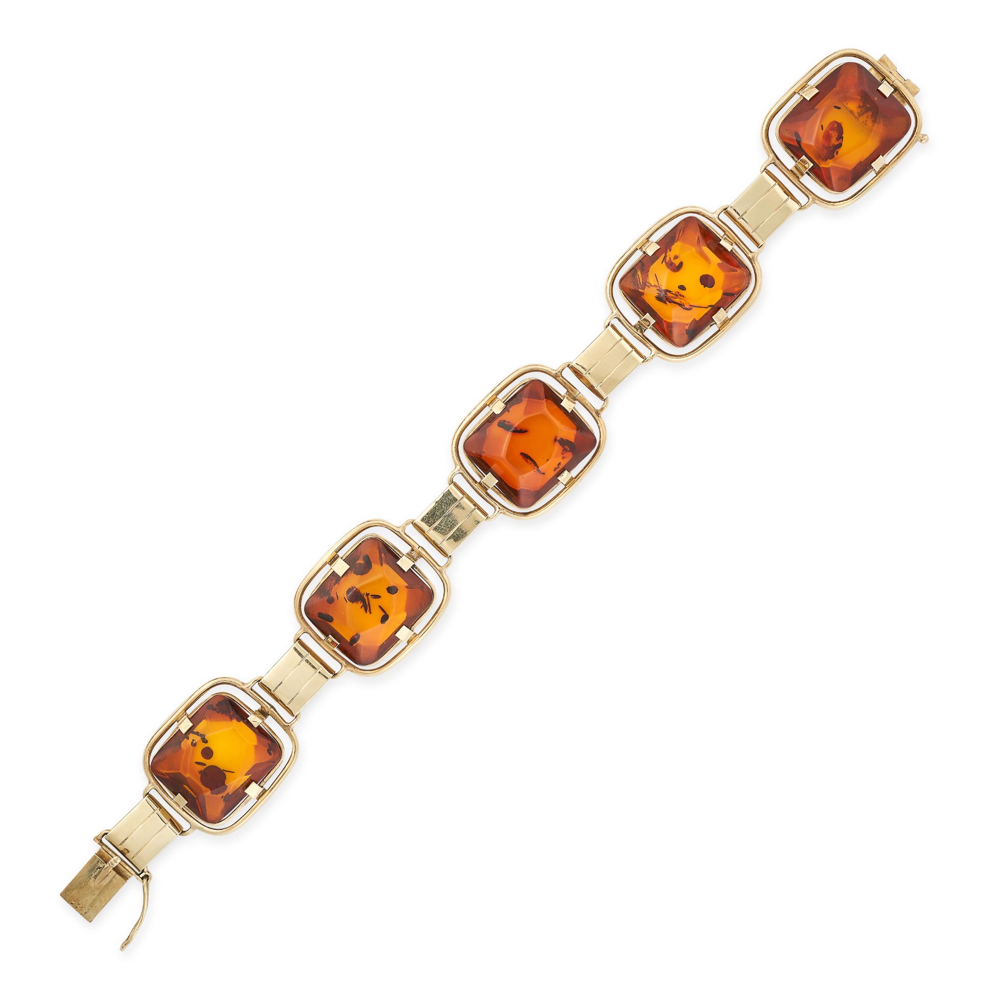 A VINTAGE AMBER BRACELET in yellow gold, set with five pieces of polished amber accented by gold