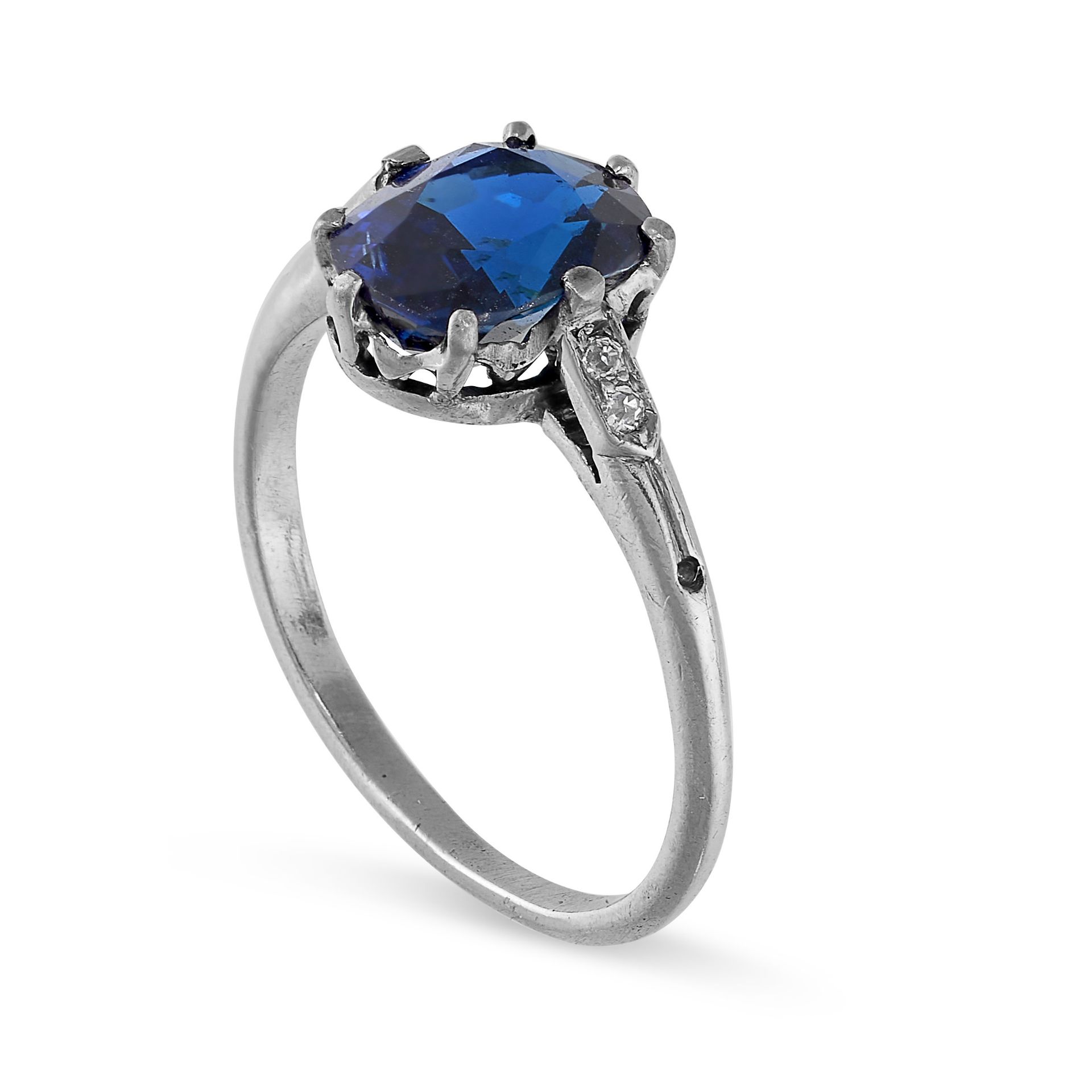 A SAPPHIRE AND DIAMOND RING in platinum, set with a cushion cut blue sapphire of 2.14 carats, - Bild 2 aus 2