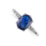 A SAPPHIRE AND DIAMOND RING in platinum, set with a cushion cut blue sapphire of 2.14 carats,