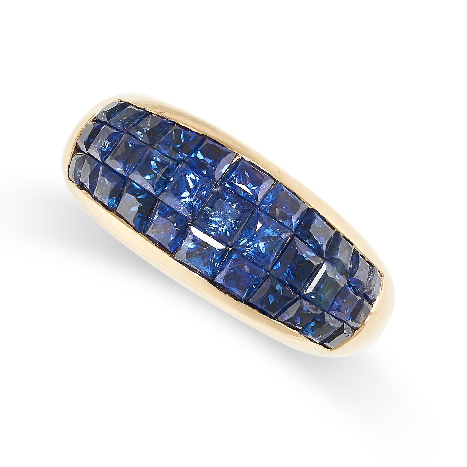 A SAPPHIRE BOMBE RING in 18ct yellow gold, set with three rows of step cut mystery set blue