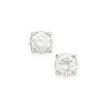 A PAIR OF DIAMOND STUD EARRINGS each set with a round brilliant cut diamond, the diamonds both