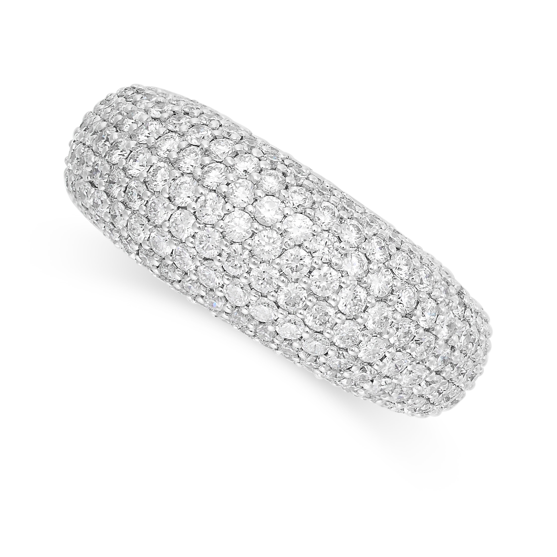 A DIAMOND BOMBE RING the tapered band pave set with round brilliant cut diamonds, the diamonds all