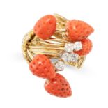 A VINTAGE CORAL AND DIAMOND RING in 18ct yellow gold, the textured gold band set with five carved