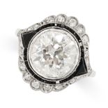 A DIAMOND AND ONYX DRESS RING set with an old European cut diamond of 4.46 carats in a calibre cut