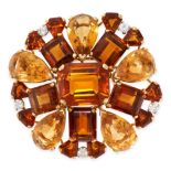 CARTIER, A VINTAGE CITRINE AND DIAMOND BROOCH, 1940s in 18ct yellow gold, designed as a floral