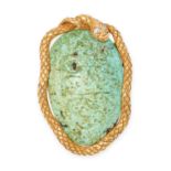 A TURQUOISE SNAKE PENDANT comprising a piece of turquoise carved with Arabic script, within a coiled