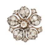 AN ANTIQUE DIAMOND FLOWER BROOCH in yellow gold and silver, designed as a flower, set with old cut