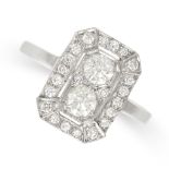 A DIAMOND RING in Art Deco design, set with two central round brilliant cut diamonds within a border