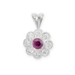 A RUBY AND DIAMOND CLUSTER PENDANT in 18ct white gold, set with a central round cut ruby of 0.34